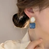 Diamante asimétrico elegante atmosférico aretes para mujeres nicho sentido del diseño moda único aretes temperamento exagerado orejeras Application Scenario